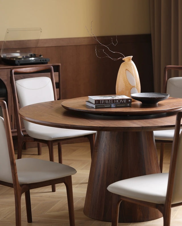 Luxury dining table set with a modern design and sleek finish.
