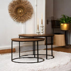 "Round cocktail table for entertaining in a contemporary living room."

