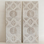 "Set of two whitewashed mango wood wall panels showing organic texture and carvings"

