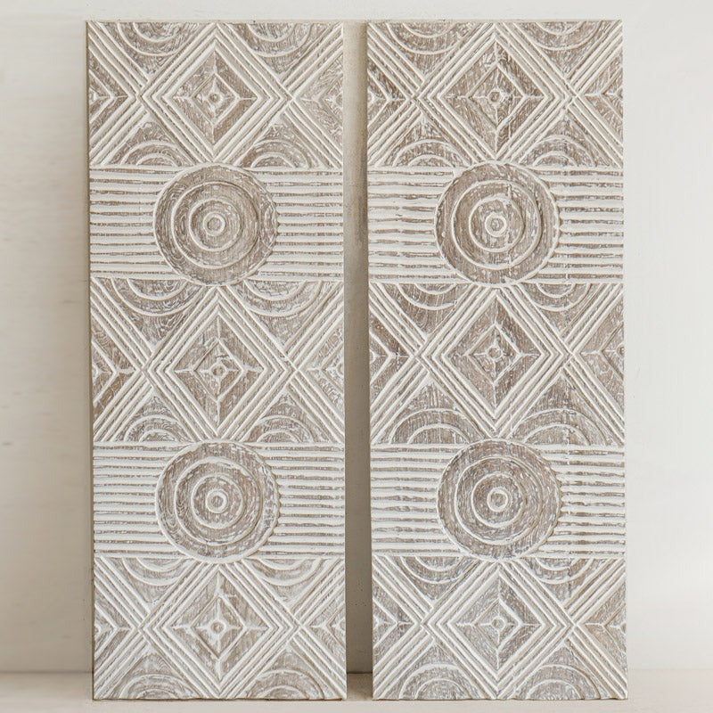 "Set of two whitewashed mango wood wall panels showing organic texture and carvings"

