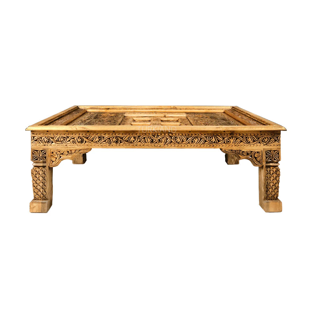 hand carved coffee table, mango wood coffee table, antique coffee table, vintage coffee table, light brown table, carved wood table, rectangular coffee table, indian furniture, living room table, statement coffee table, handmade coffee table, artisan made table, premium wood table, quality furniture, durable table, sturdy table, timeless table, elegant table, ornate table, unique table, sculptural table, focal piece table, handcrafted in india, sustainable mango wood, antique vintage finish, light brown fin