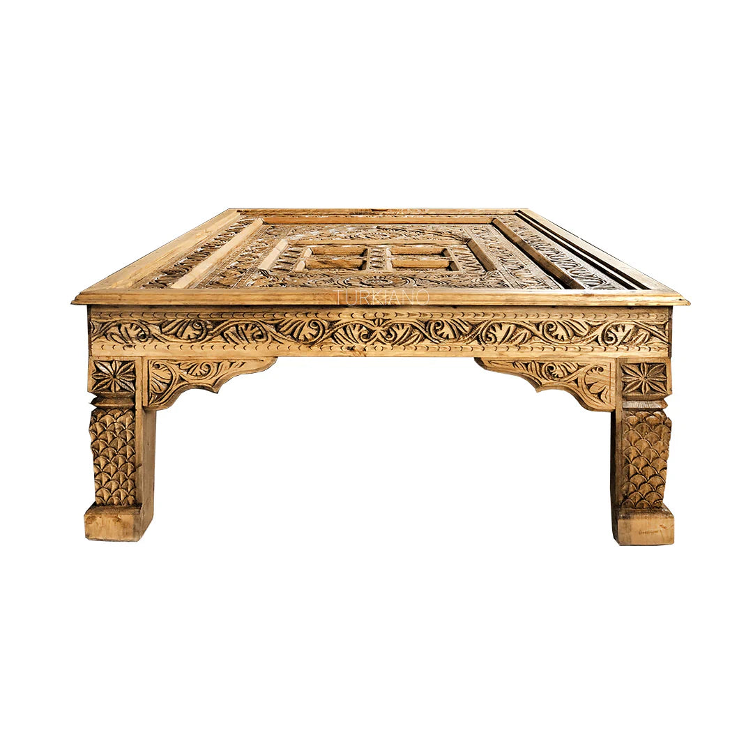 hand carved coffee table, mango wood coffee table, antique coffee table, vintage coffee table, light brown table, carved wood table, rectangular coffee table, indian furniture, living room table, statement coffee table, handmade coffee table, artisan made table, premium wood table, quality furniture, durable table, sturdy table, timeless table, elegant table, ornate table, unique table, sculptural table, focal piece table, handcrafted in india, sustainable mango wood, antique vintage finish, light brown fin
