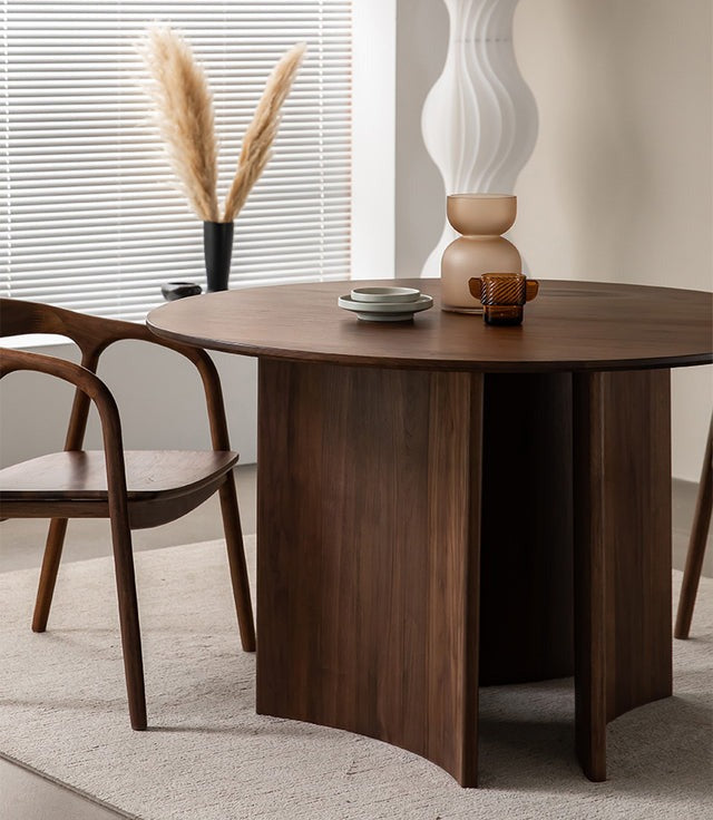 "Modern dining table with sleek lines and contemporary design."
