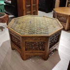 hand carved coffee table, jali coffee table, mango wood coffee table, octagonal coffee table, lattice coffee table, carved wood table, indian furniture, living room table, statement coffee table, handmade coffee table, artisan made table, premium wood table, quality furniture, durable table, sturdy table, timeless table, elegant table, ornate table, unique table, sculptural table, focal piece table, handcrafted in india, sustainable mango wood, whitewash finish, light walnut finish, jali lattice, star latti