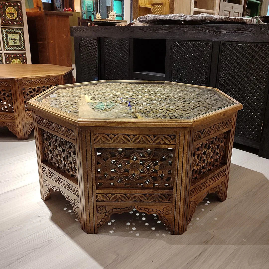 hand carved coffee table, jali coffee table, mango wood coffee table, octagonal coffee table, lattice coffee table, carved wood table, indian furniture, living room table, statement coffee table, handmade coffee table, artisan made table, premium wood table, quality furniture, durable table, sturdy table, timeless table, elegant table, ornate table, unique table, sculptural table, focal piece table, handcrafted in india, sustainable mango wood, whitewash finish, light walnut finish, jali lattice, star latti