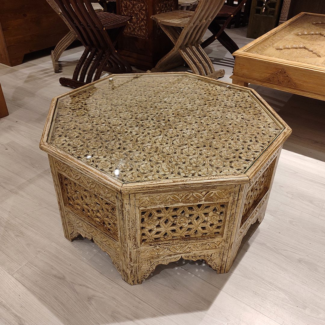 hand carved coffee table, jali coffee table, mango wood coffee table, octagonal coffee table, lattice coffee table, carved wood table, indian furniture, living room table, statement coffee table, handmade coffee table, artisan made table, premium wood table, quality furniture, durable table, sturdy table, timeless table, elegant table, ornate table, unique table, sculptural table, focal piece table, handcrafted in india, sustainable mango wood, whitewash finish, light walnut finish, jali lattice, star latti