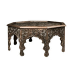 hand carved coffee table, solid wood coffee table, octagonal coffee table, carved wood table, indian furniture, living room table, statement coffee table, mehrab arch table, handmade coffee table, artisan made table, premium wood table, quality furniture, durable table, sturdy table, timeless table, elegant table, ornate table, unique table, sculptural table, focal piece table, handcrafted in india, sustainable wood furniture, star medallion design, geometric patterns, scrolling vines, floral rosettes, mehr