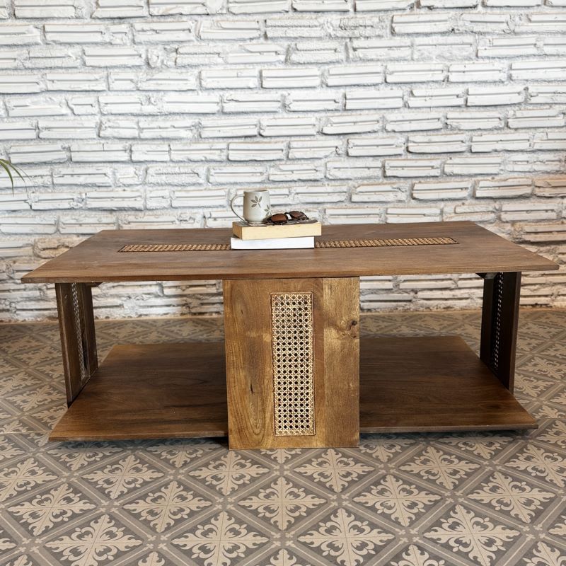mango wood table, cane coffee table, rattan coffee table, rectangular table, walnut finish table, storage coffee table, woven cane table, coastal table, mid century table, bohemian table, living room table, statement coffee table, handmade coffee table, artisan made table, premium wood table, quality furniture, durable table, sturdy table, timeless table, elegant table, unique table, sculptural table, focal piece table, handcrafted in india, sustainable mango wood, natural wood grain, walnut brown finish, w