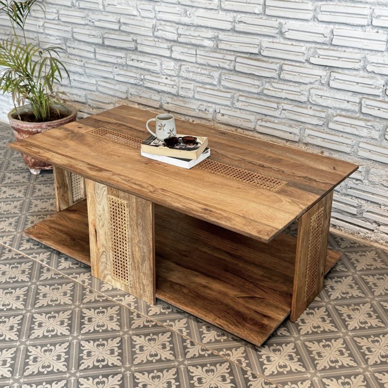 mango wood table, cane coffee table, rattan coffee table, rectangular table, walnut finish table, storage coffee table, woven cane table, coastal table, mid century table, bohemian table, living room table, statement coffee table, handmade coffee table, artisan made table, premium wood table, quality furniture, durable table, sturdy table, timeless table, elegant table, unique table, sculptural table, focal piece table, handcrafted in india, sustainable mango wood, natural wood grain, walnut brown finish, w