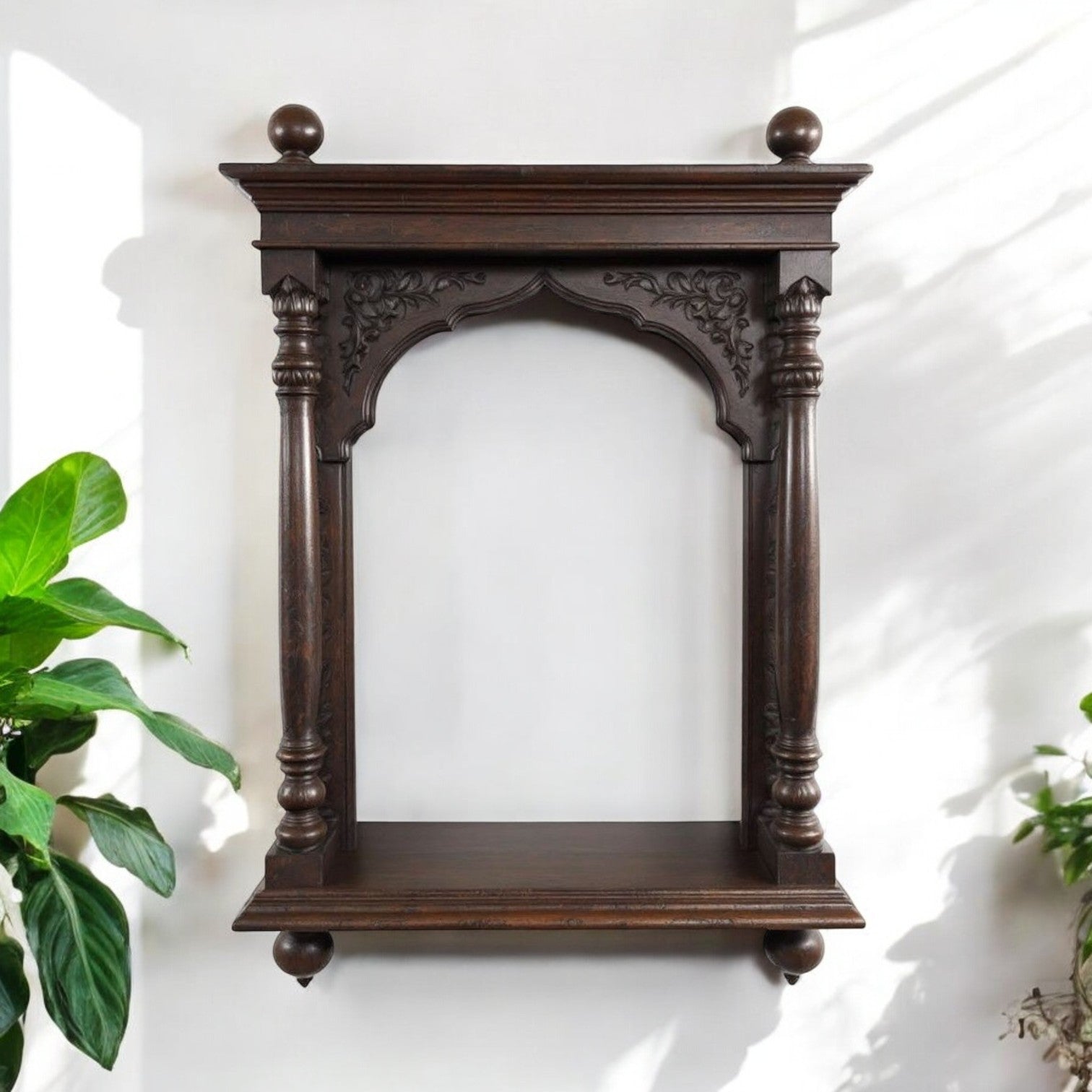Jodhpur hand-carved archway pooja shelf with dark wood antique wood art finish, featuring columns and finials. Handcrafted in Jodhpur, Rajasthan. Ideal for antique home decor, pooja display, and decorative purposes.