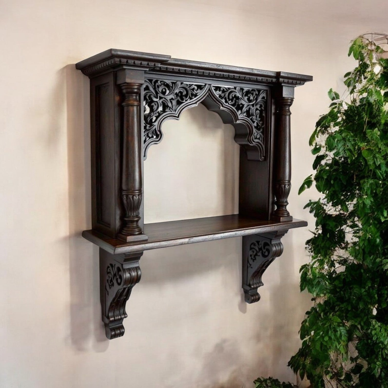 Jodhpur hand-carved archway wall shelf with dark wood antique wood art finish, mounted on a wall. Handcrafted in Jodhpur, Rajasthan. Ideal for antique home decor 