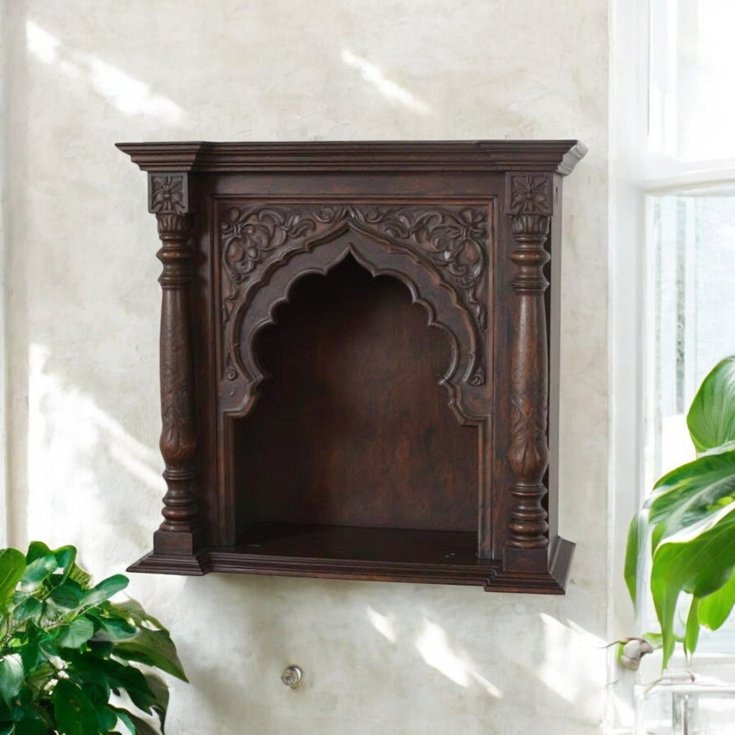 Jodhpur antique ornate hand-carved wall mounted wood shelf with dark wood antique wood art finish, featuring an archway niche. Handcrafted in Jodhpur, Rajasthan. Ideal for antique home decor and decorative display.