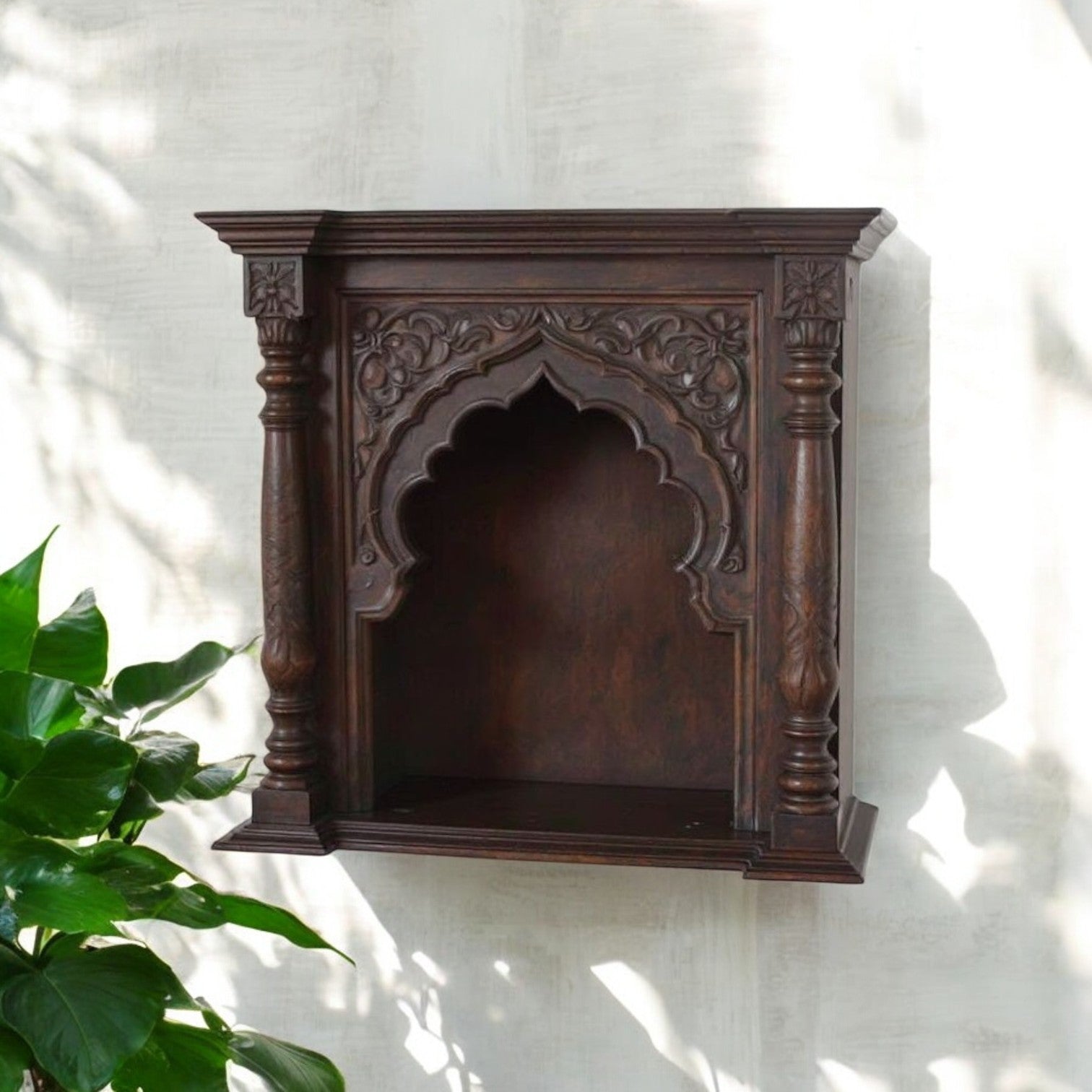 Jodhpur antique ornate hand-carved wall mounted wood shelf with dark wood antique wood art finish, featuring an archway niche. Handcrafted in Jodhpur, Rajasthan. Ideal for antique 
