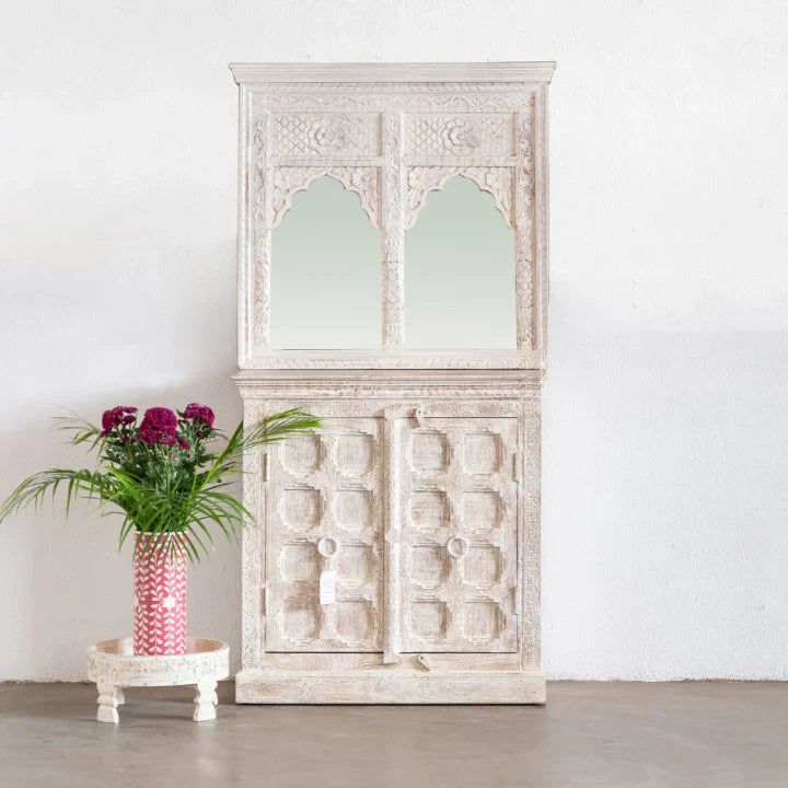 hand carved cabinet, mango wood cabinet, mirrored cabinet, white wash cabinet, 2 door cabinet, jharokha cabinet, arched mirror cabinet, indian carved furniture, storage cabinet, dining room cabinet, living room cabinet, bedroom cabinet, entryway cabinet, tall cabinet, statement cabinet, handmade cabinet, artisan made cabinet, premium wood cabinet, quality wood furniture, durable cabinet, sturdy cabinet, timeless cabinet, elegant cabinet, grand cabinet, heirloom cabinet, coastal cabinet, shabby chic cabinet,