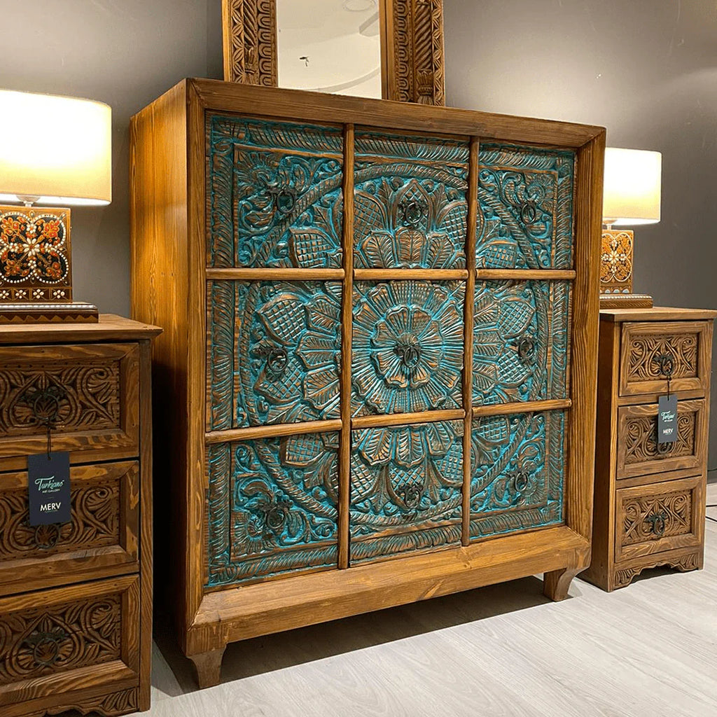 hand carved chest, mango wood dresser, chest of drawers, turquoise chest, 9 drawer dresser, floral carved dresser, carved chest, bohemian dresser, indian furniture, bedroom dresser, dining room chest, living room dresser, storage chest, handmade dresser, artisan made chest, premium wood dresser, quality wood furniture, durable chest, sturdy dresser, timeless chest, elegant dresser, statement chest, heirloom dresser, boho chest, eclectic dresser, global style chest, vintage dresser, rustic chest, traditional