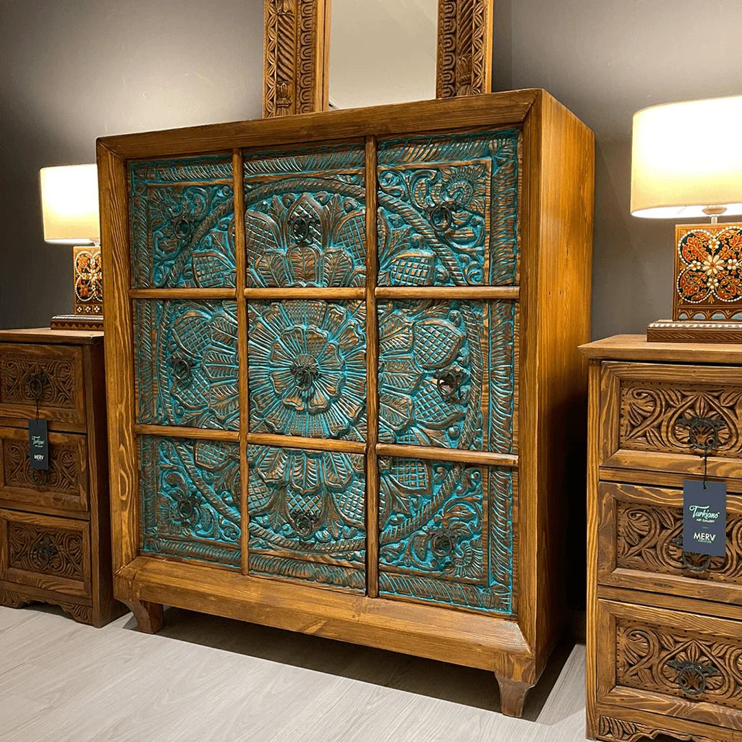 hand carved chest, mango wood dresser, chest of drawers, turquoise chest, 9 drawer dresser, floral carved dresser, carved chest, bohemian dresser, indian furniture, bedroom dresser, dining room chest, living room dresser, storage chest, handmade dresser, artisan made chest, premium wood dresser, quality wood furniture, durable chest, sturdy dresser, timeless chest, elegant dresser, statement chest, heirloom dresser, boho chest, eclectic dresser, global style chest, vintage dresser, rustic chest, traditional