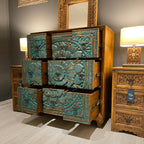 hand carved chest, mango wood dresser, chest of drawers, turquoise chest, 9 drawer dresser, floral carved dresser, carved chest, bohemian dresser, indian furniture, bedroom dresser, dining room chest, living room dresser, storage chest, handmade dresser, artisan made chest, premium wood dresser, quality wood furniture, durable chest, sturdy dresser, timeless chest, elegant dresser, statement chest, heirloom dresser, boho chest, eclectic dresser, global style chest, vintage dresser, rustic chest, traditional
