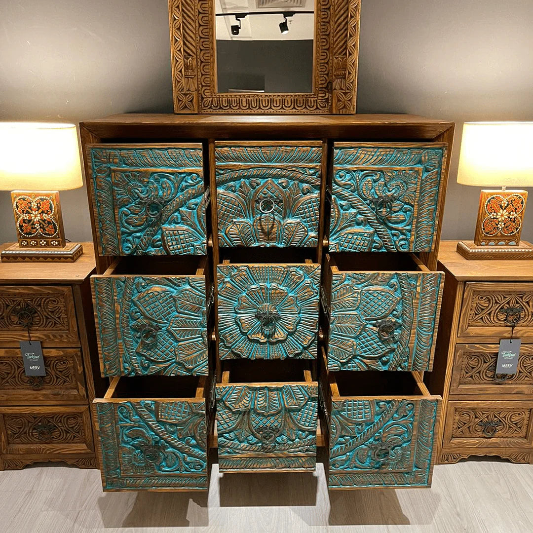 hand carved chest, mango wood dresser, chest of drawers, turquoise chest, 9 drawer dresser, floral carved dresser, carved chest, bohemian dresser, indian furniture, bedroom dresser, dining room chest, living room dresser, storage chest, handmade dresser, artisan made chest, premium wood dresser, quality wood furniture, durable chest, sturdy dresser, timeless chest, elegant dresser, statement chest, heirloom dresser, boho chest, eclectic dresser, global style chest, vintage dresser, rustic chest, traditional