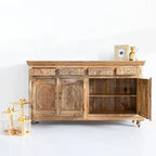 hand carved sideboard, mango wood sideboard, natural finish sideboard, floral carved sideboard, 4 door sideboard, 4 drawer sideboard, buffet sideboard, indian carved furniture, storage sideboard, dining room buffet, living room sideboard, entryway sideboard, statement sideboard, large sideboard, handmade sideboard, artisan made sideboard, premium wood buffet, quality wood furniture, durable sideboard, sturdy buffet, timeless sideboard, elegant buffet, grand sideboard, heirloom buffet, rustic sideboard, trad