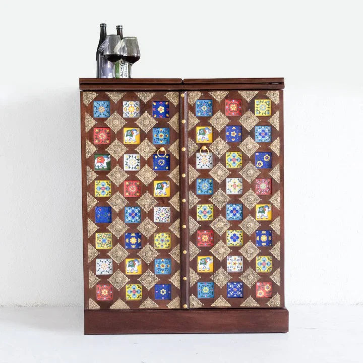handmade bar cabinet, mango wood bar cabinet, moroccan tile cabinet, ceramic tile inlay, brass work cabinet, wine cabinet, liquor cabinet, home bar cabinet, dining room bar cabinet, living room bar cabinet, storage cabinet, 2 door cabinet, 2 drawer cabinet, wine rack cabinet, glass storage cabinet, drop down door cabinet, artisan made cabinet, premium wood cabinet, quality wood furniture, durable bar cabinet, sturdy cabinet, elegant bar cabinet, statement bar cabinet, moroccan style cabinet, global style ca