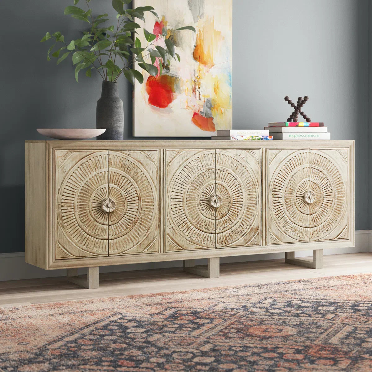 mango wood sideboard, carved sideboard, medallion sideboard, white sideboard, whitewashed sideboard, large sideboard, storage sideboard, circular carving, spiral medallion, coastal sideboard, accent cabinet, living room storage, dining room cabinet, hallway storage, behind sofa cabinet, statement sideboard, handmade sideboard, artisan made cabinet, premium wood furniture, quality furniture, durable cabinet, sturdy sideboard, timeless furniture, elegant sideboard, unique cabinet, decorative sideboard, focal 