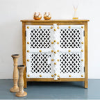 hand carved sideboard, mango wood sideboard, 2 door sideboard, two tone sideboard, white and natural sideboard, lattice carved sideboard, brass stud sideboard, openwork sideboard, indian carved furniture, storage sideboard, dining room sideboard, living room sideboard, bedroom sideboard, entryway sideboard, accent sideboard, statement sideboard, compact sideboard, handmade sideboard, artisan made sideboard, premium wood sideboard, quality wood furniture, durable sideboard, sturdy sideboard, timeless sideboa