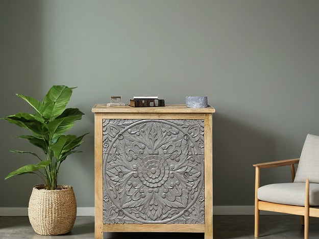 "Solid wood cabinet with spacious drawers for organizing essentials."
