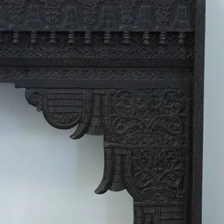 "Sleek wood console table in a minimalist entryway, offering storage and style."
