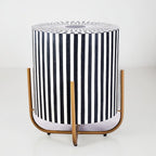 "Round side table with a sleek gold finish for a luxurious touch."

