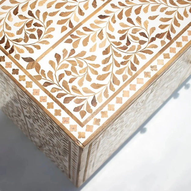 Luxurious bone inlay cabinet in a neutral palette.
