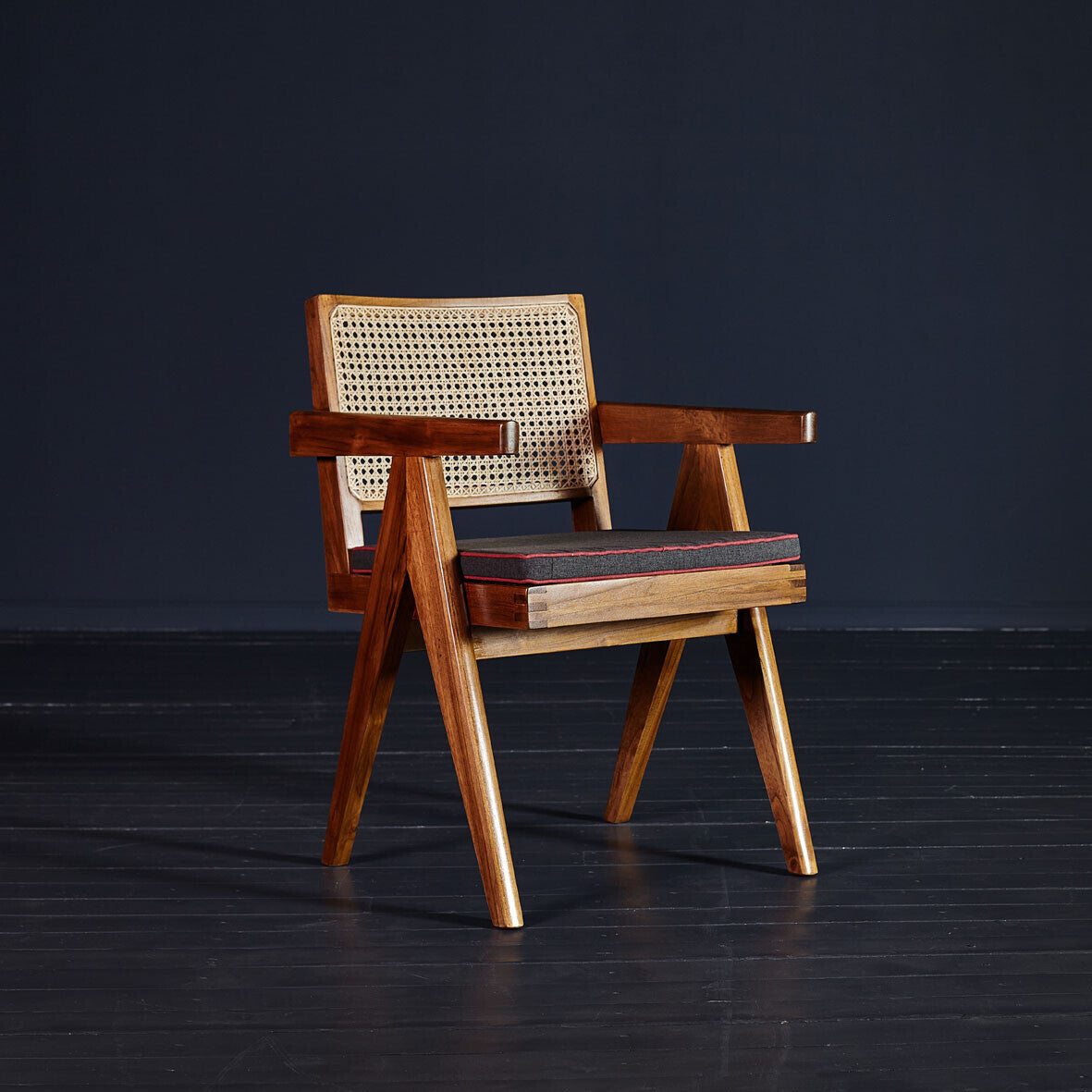 Solid acacia wood armchair with handwoven rattan cane backrest