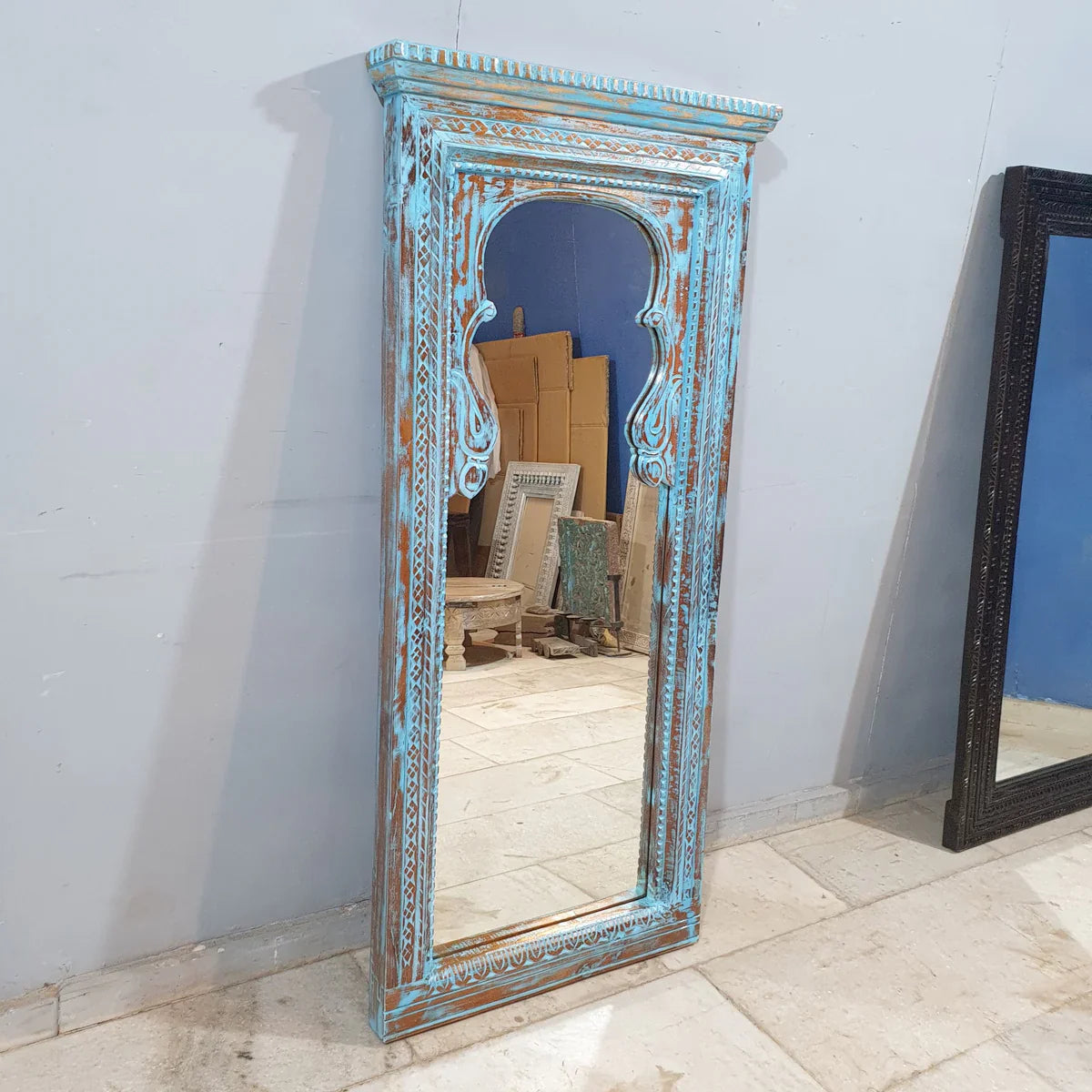 hand carved mirror, wooden frame mirror, rustic blue mirror, turquoise mirror, distressed blue mirror, full length mirror, wall mirror, mehrab arch mirror, arched mirror, entryway mirror, narrow mirror, dressing mirror, decorative mirror, indian furniture, handmade mirror, artisan made mirror, premium wood mirror, quality mirror, durable mirror, sturdy mirror, timeless mirror, elegant mirror, statement mirror, ornate mirror, unique mirror, sculptural mirror, focal piece mirror, handcrafted in india, sustain
