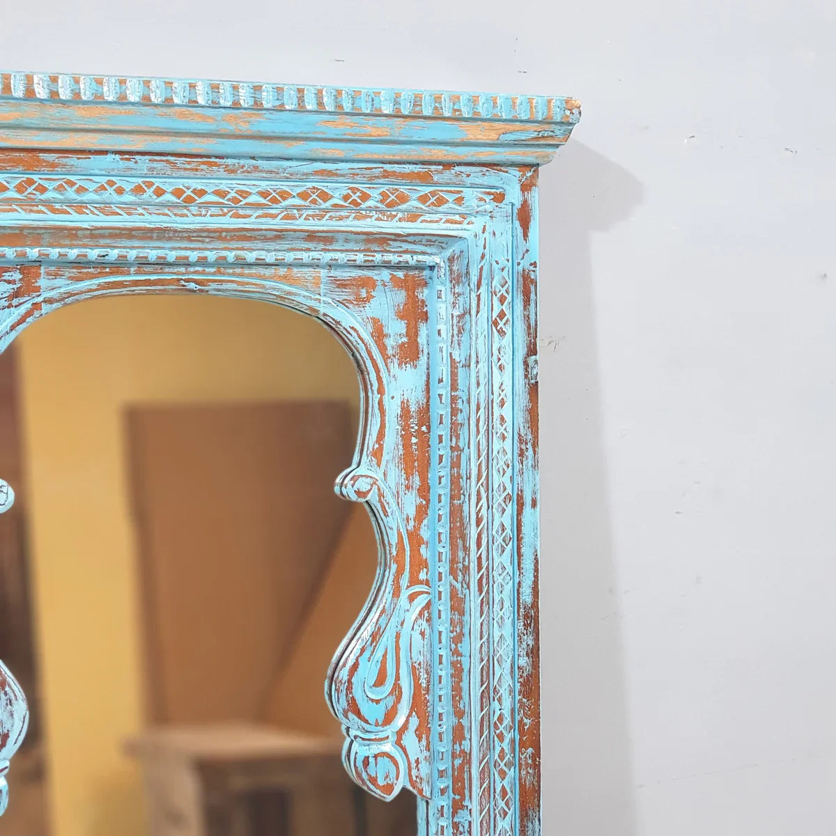 hand carved mirror, wooden frame mirror, rustic blue mirror, turquoise mirror, distressed blue mirror, full length mirror, wall mirror, mehrab arch mirror, arched mirror, entryway mirror, narrow mirror, dressing mirror, decorative mirror, indian furniture, handmade mirror, artisan made mirror, premium wood mirror, quality mirror, durable mirror, sturdy mirror, timeless mirror, elegant mirror, statement mirror, ornate mirror, unique mirror, sculptural mirror, focal piece mirror, handcrafted in india, sustain