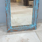 hand carved mirror, wooden frame mirror, rustic blue mirror, turquoise mirror, distressed blue mirror, full length mirror, wall mirror, mehrab arch mirror, arched mirror, entryway mirror, narrow mirror, dressing mirror, decorative mirror, indian furniture, handmade mirror, artisan made mirror, premium wood mirror, quality mirror, durable mirror, sturdy mirror, timeless mirror, elegant mirror, statement mirror, ornate mirror, unique mirror, sculptural mirror, focal piece mirror, handcrafted in india, sustain