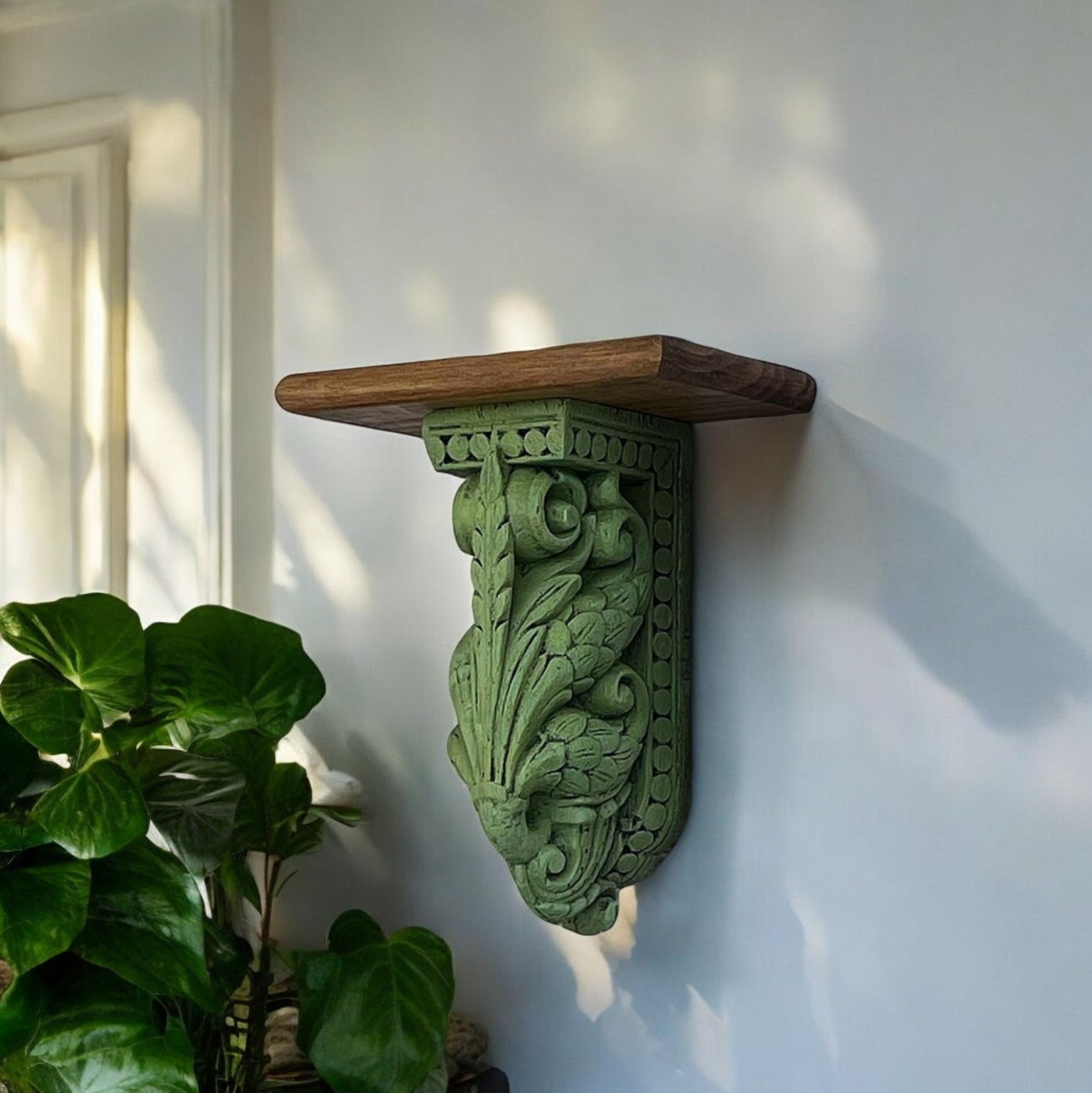 "Close-up of the intricate carvings and distressed finishes on the set of three wooden shelves."

