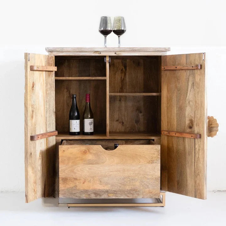 hand carved bar cabinet, mango wood bar cabinet, bar cabinet on stand, metal stand cabinet, sunburst carved cabinet, natural finish cabinet, wine cabinet, liquor cabinet, home bar cabinet, dining room bar cabinet, living room bar cabinet, storage cabinet, 2 door cabinet, drawer cabinet, handmade bar cabinet, artisan made cabinet, premium wood cabinet, quality wood furniture, durable bar cabinet, sturdy cabinet, timeless bar cabinet, elegant cabinet, statement bar cabinet, industrial style cabinet, modern ba