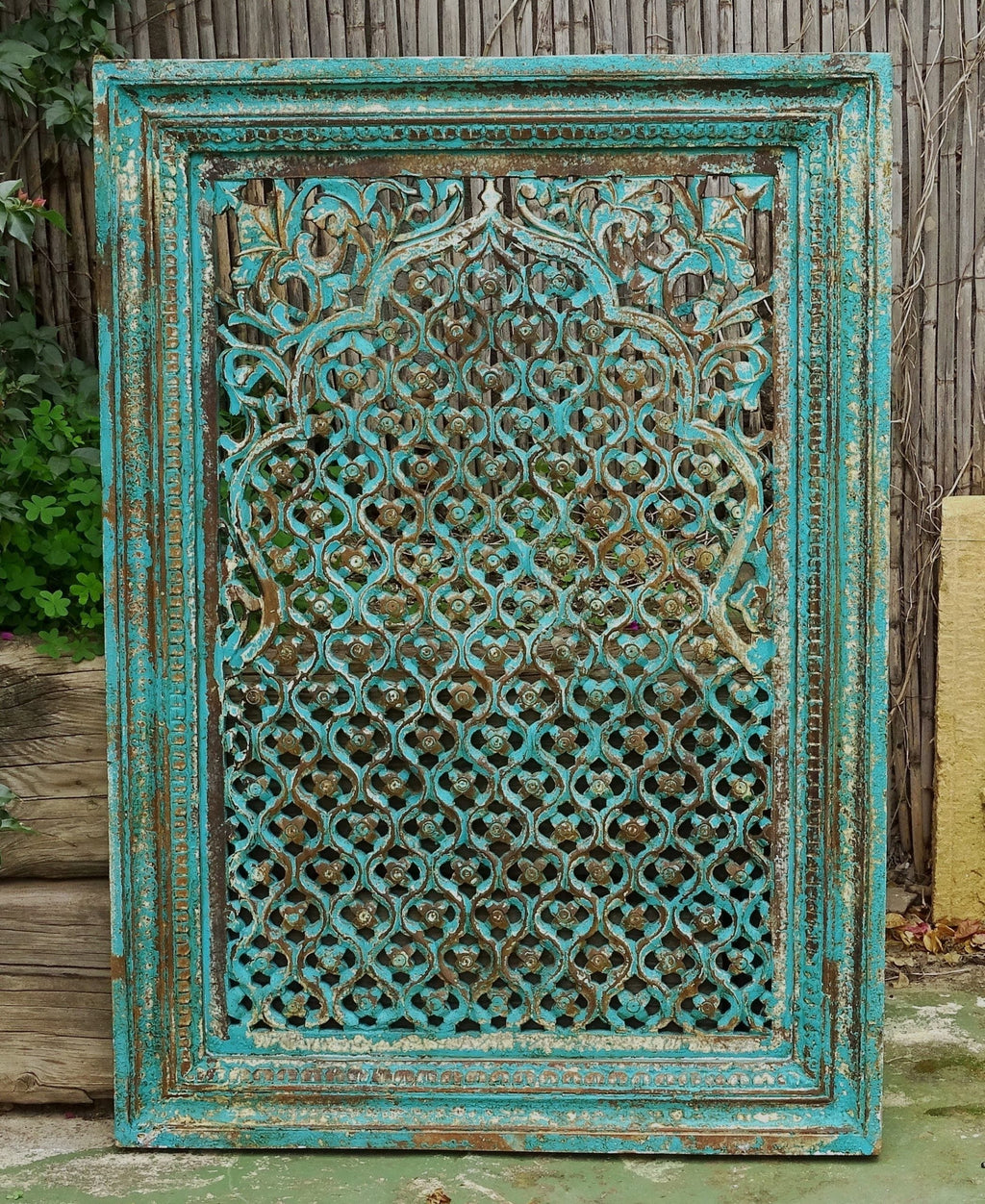 hand carved wall panel, mango wood wall art, distressed turquoise panel, jali carved panel, openwork wall hanging, quatrefoil lattice panel, jali wall art, indian furniture, living room wall art, bedroom wall decor, entryway wall panel, decorative wall panel, handmade wall art, artisan made panel, premium wood art, quality wood decor, durable wall panel, timeless wall art, elegant panel, statement wall decor, decorative panel, unique wall art, sculptural panel, focal piece art, handcrafted in india, sustain