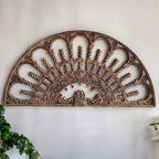 Close-up of traditional carvings on 183cm wide wooden wall decor
