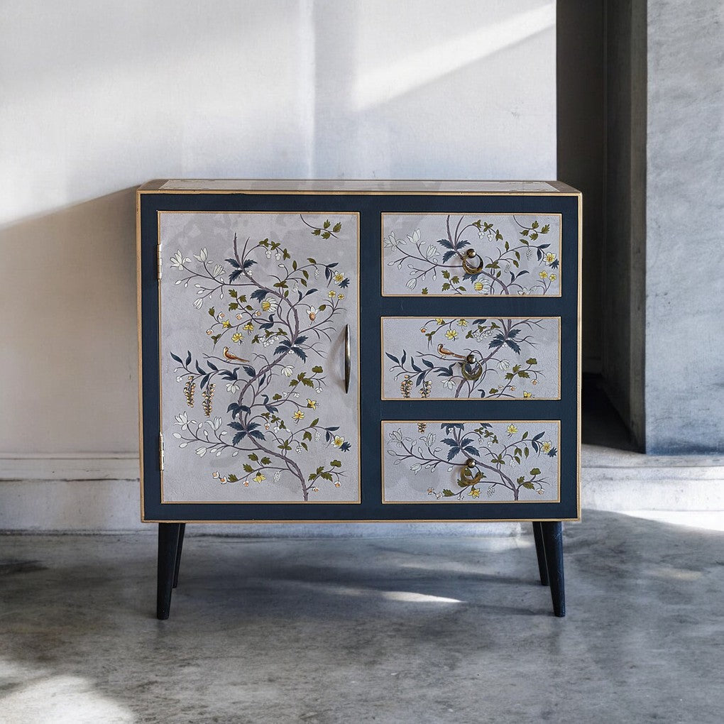 Open drawers showcasing storage – boho bedroom cabinet with flower art

