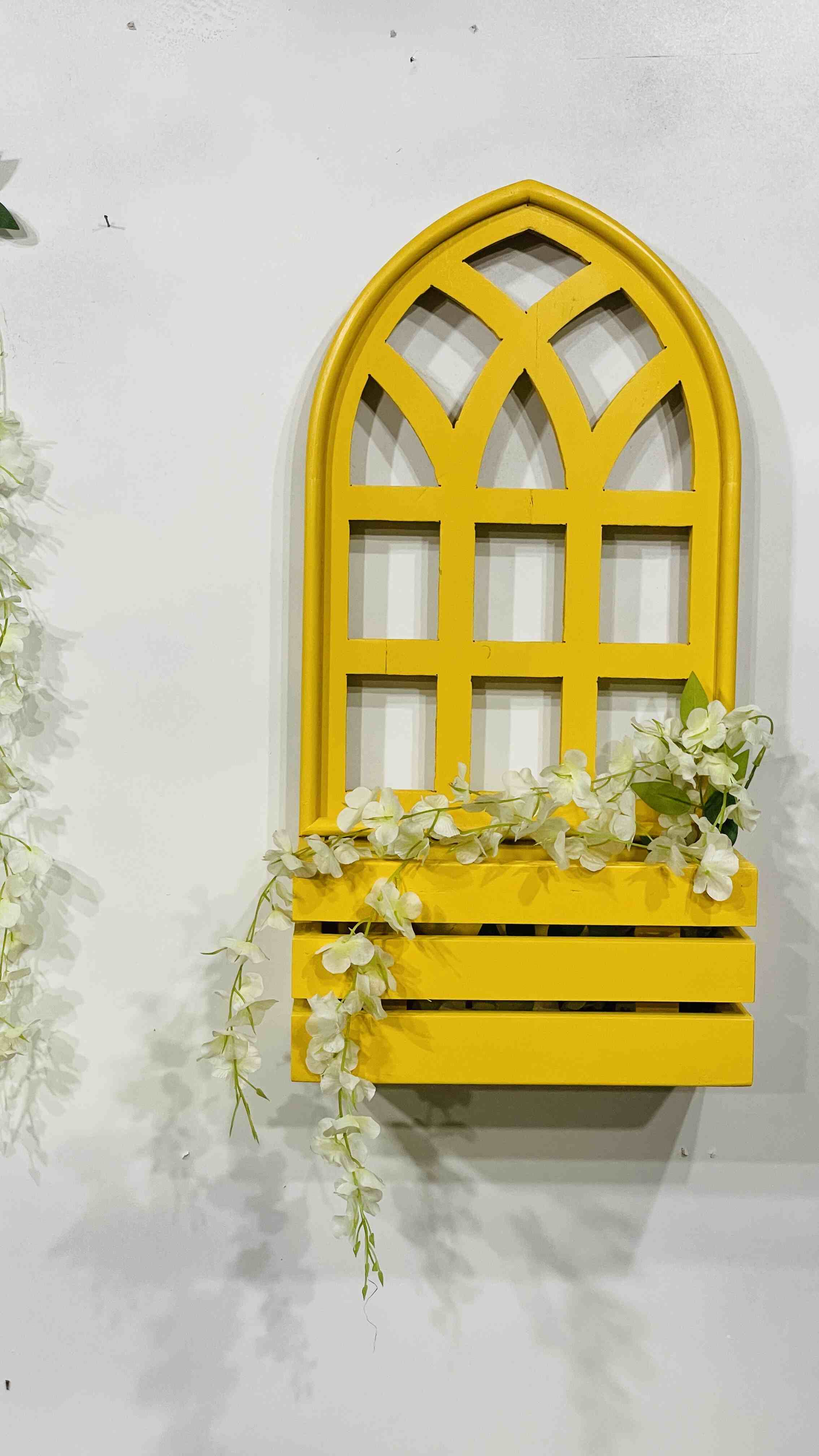 wall hanging pots, wall mounted planters, and hanging plant stands for home decor. Featuring wall mounted plant pots, wooden wall planters, and wall planters for living room, perfect for creating an indoor plant wall or unique plant wall decor. Explore wall mounted flower planters, wall plant stands, and jharokha wall decor for a vibrant, natural touch in any space. Available in various styles including wall mounted planters outdoor and hanging pots online, ideal for enhancing your living space with greener