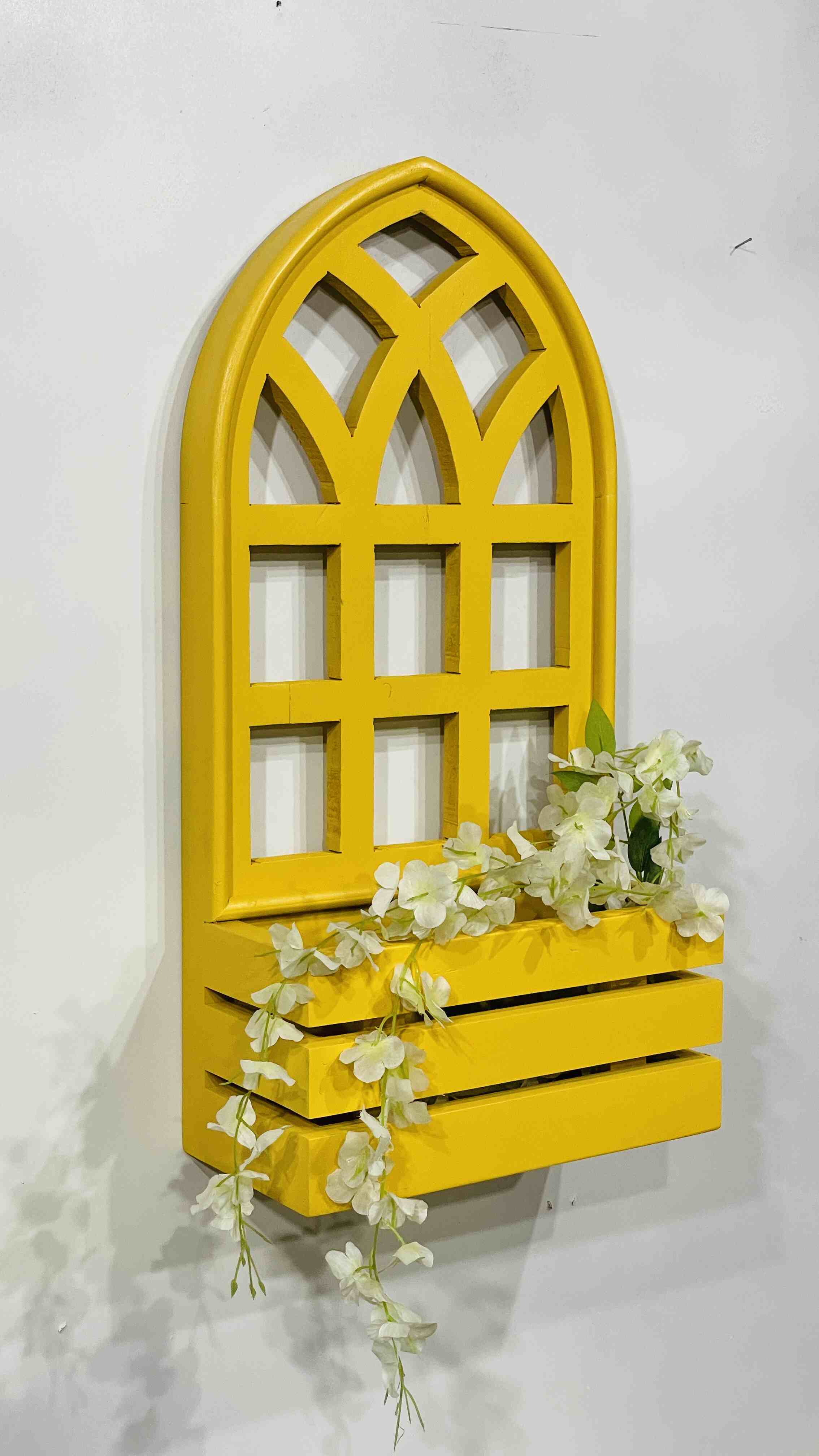 wall hanging pots, wall mounted planters, and hanging plant stands for home decor. Featuring wall mounted plant pots, wooden wall planters, and wall planters for living room, perfect for creating an indoor plant wall or unique plant wall decor. Explore wall mounted flower planters, wall plant stands, and jharokha wall decor for a vibrant, natural touch in any space. Available in various styles including wall mounted planters outdoor and hanging pots online, ideal for enhancing your living space with greener