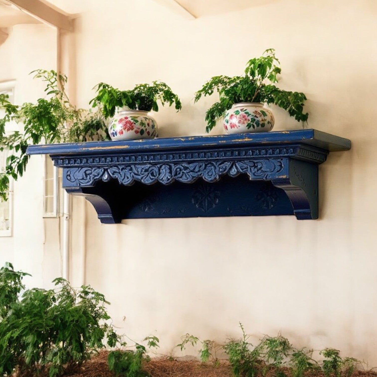 80 cm wide wooden shelf displaying brass pots and textiles