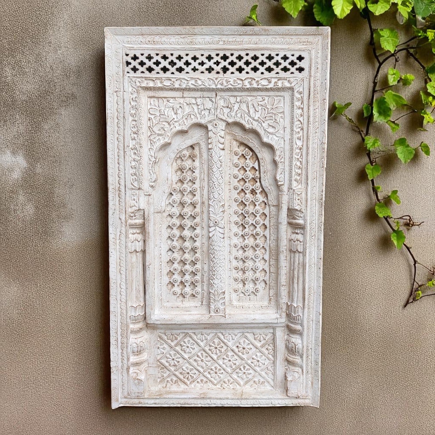 Vintage carved wood and brass window frame wall hanging, mango wood, 122 × 69 × 10 cm.


