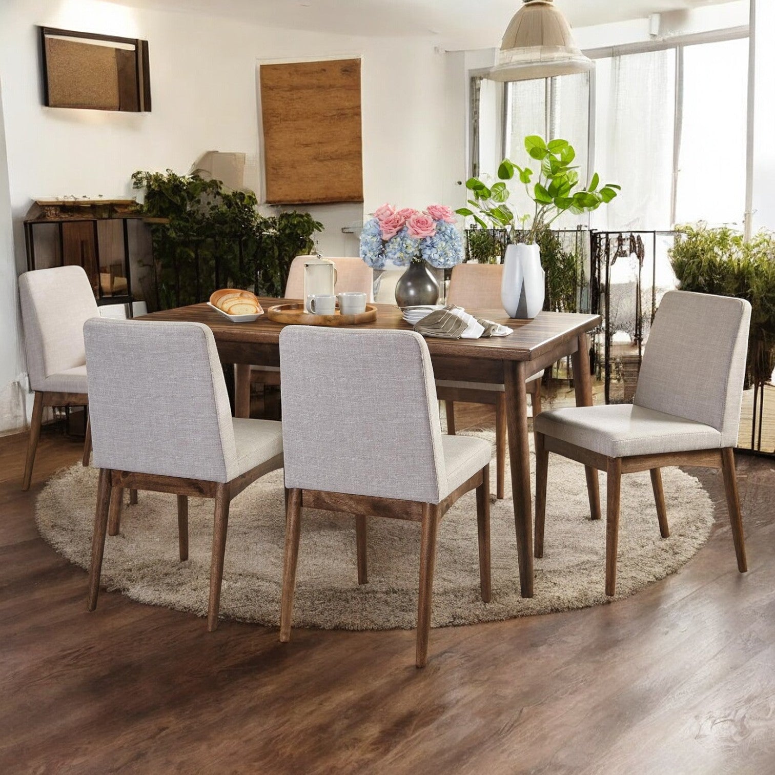 Dining table set featuring a modern style for a cozy dining room.
