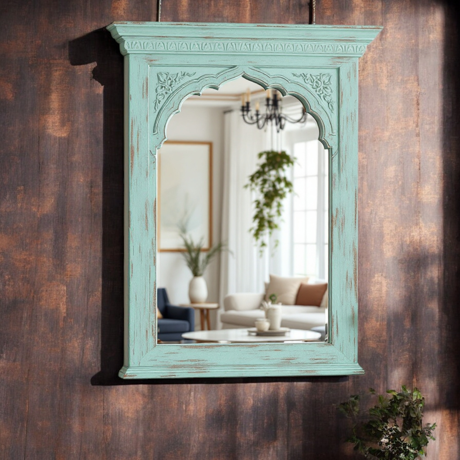 "Close-up of the carved arch design and distressed mint green frame of the Jharokha mirror, handcrafted in Jodhpur."

