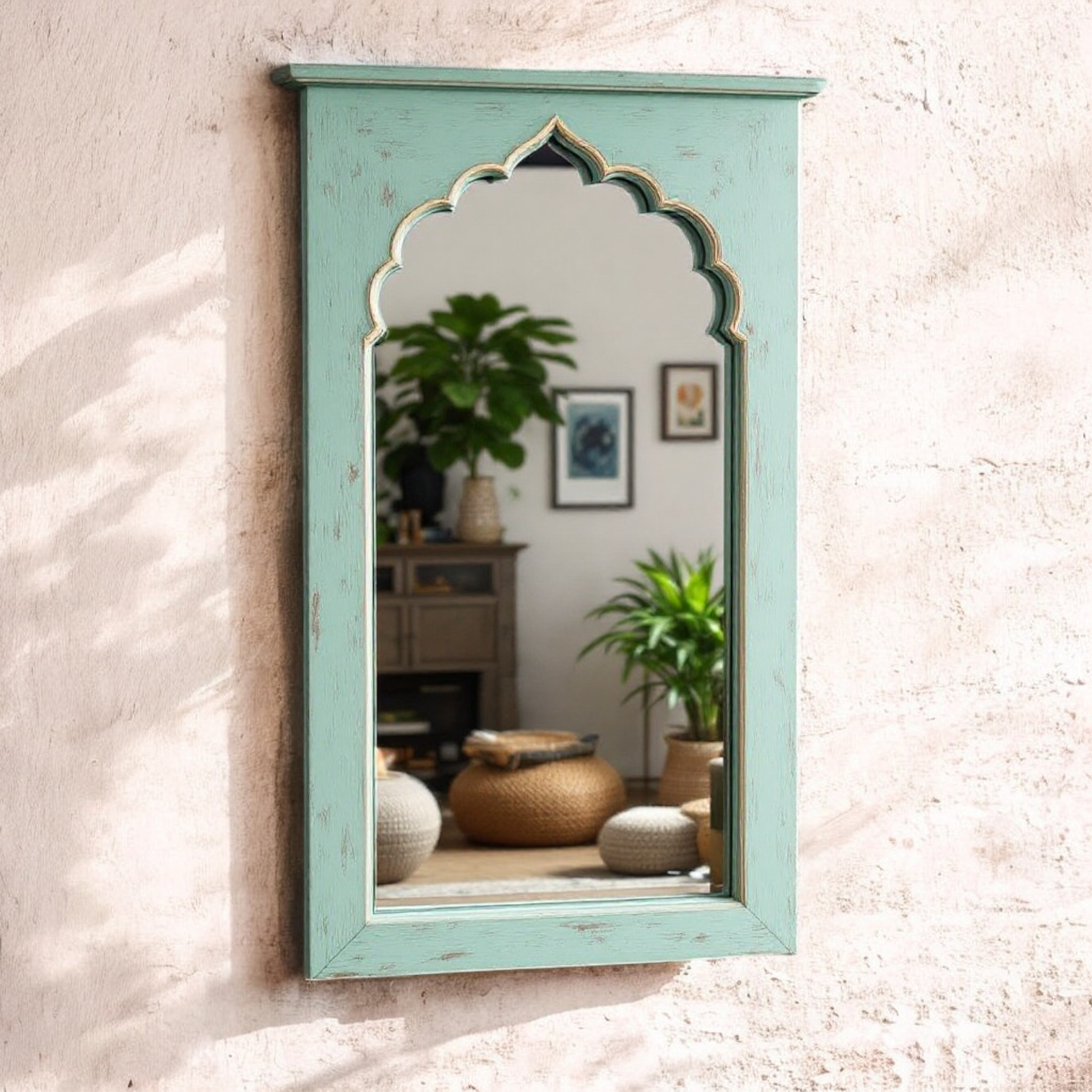 "Decorative Jharokha wall mirror with a unique cultural design, mounted on a rustic wooden wall."

