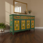 hand painted sideboard, solid wood sideboard, floral sideboard, folk art sideboard, green sideboard, painted cabinet, storage sideboard, bohemian sideboard, colorful sideboard, accent cabinet, living room storage, hallway cabinet, dining room cabinet, bedroom storage, statement sideboard, handmade sideboard, artisan made cabinet, premium wood furniture, quality furniture, durable cabinet, sturdy sideboard, timeless furniture, elegant sideboard, unique cabinet, decorative sideboard, focal piece cabinet, hand