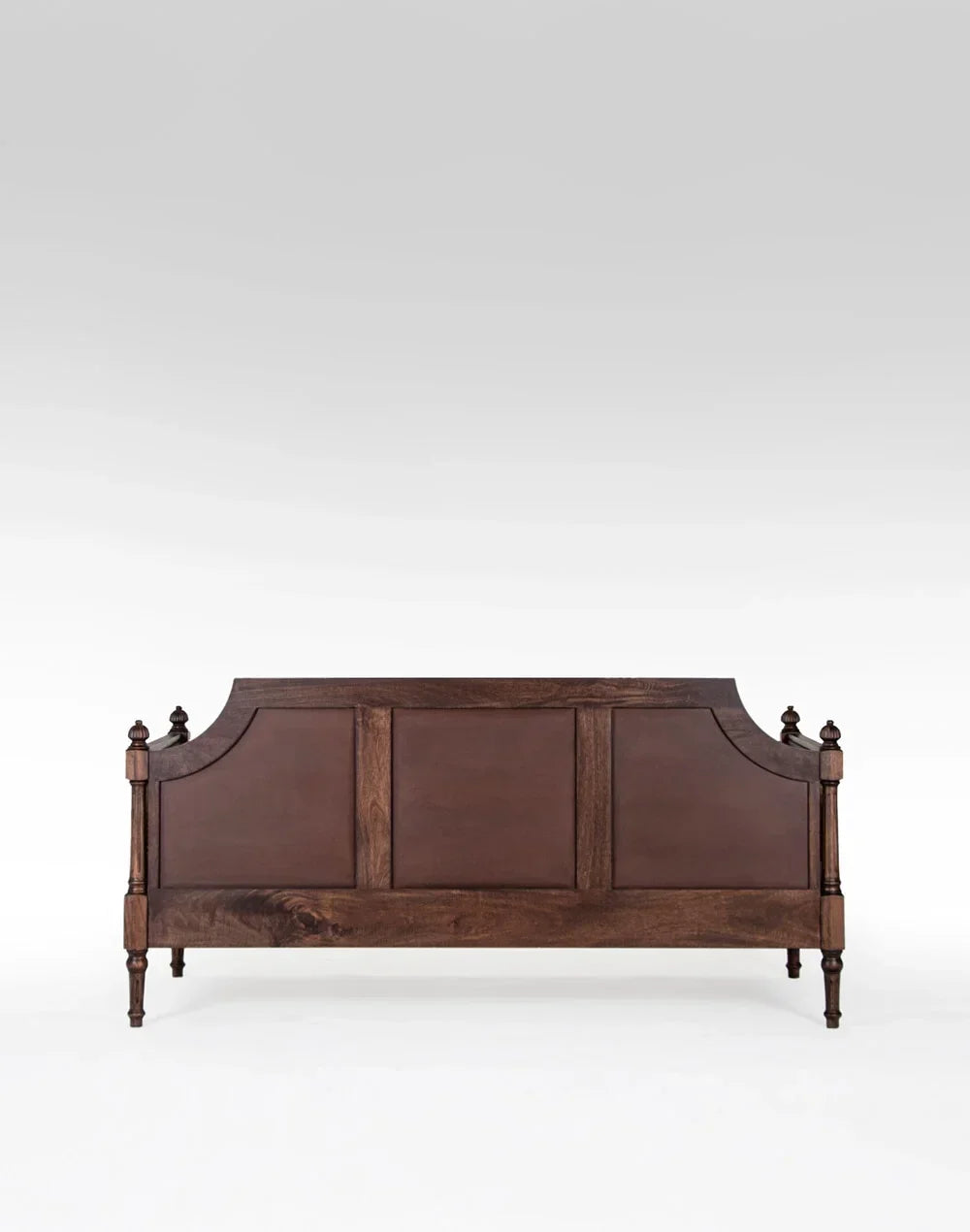 Wooden bed with a dark brown finish on a white background