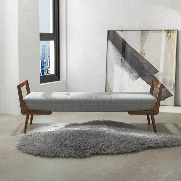 Stylish bedroom bench at the foot of the bed.
