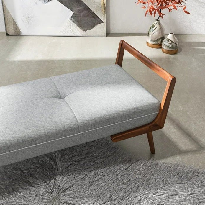 Elegant wooden bench for living room decor.
